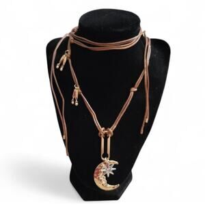 Boho wrap around brown, gold, and silver tone moon & star charm pendant necklace